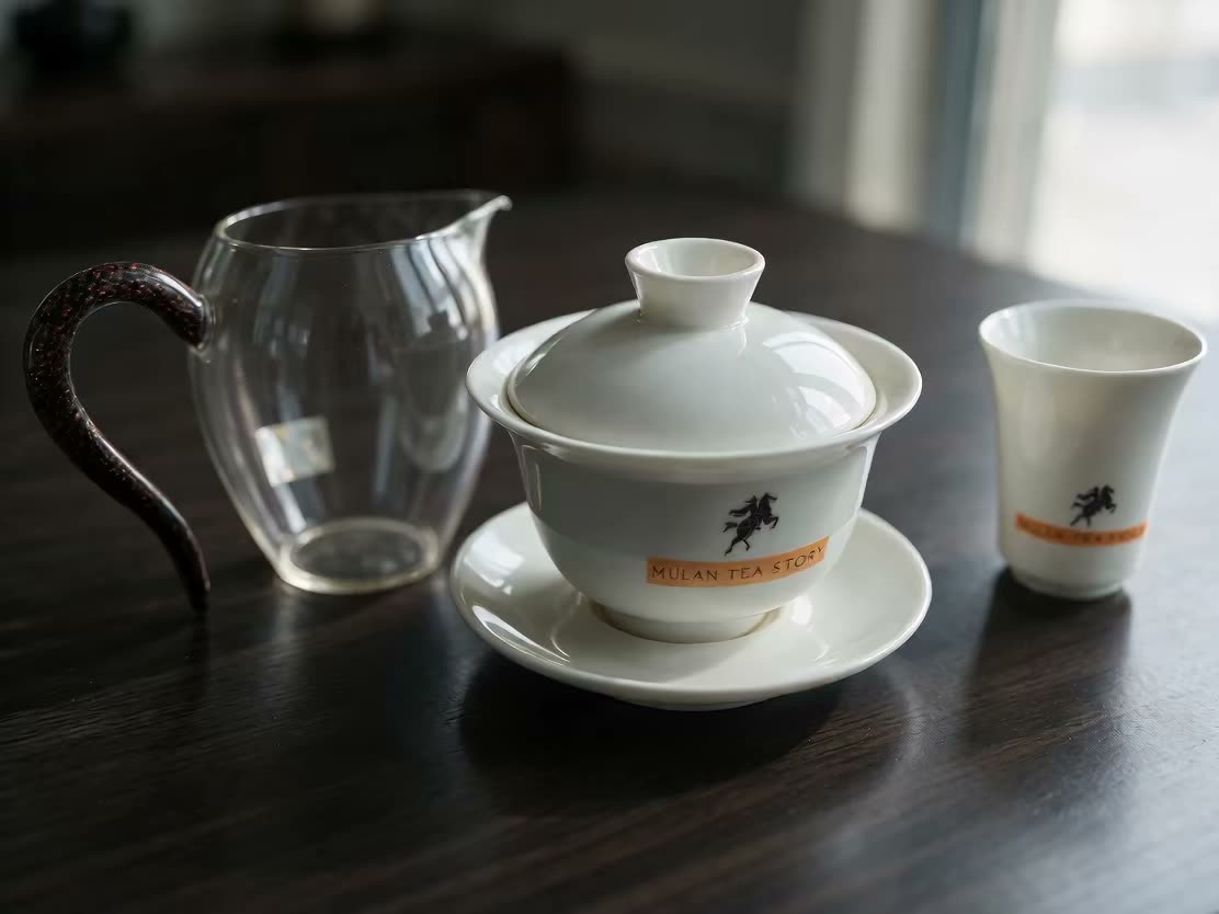 A white porcelain gaiwan on the wheel